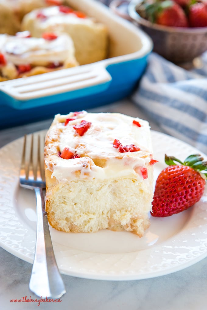 Strawberry Cheesecake Sweet Rolls on white plate with fork