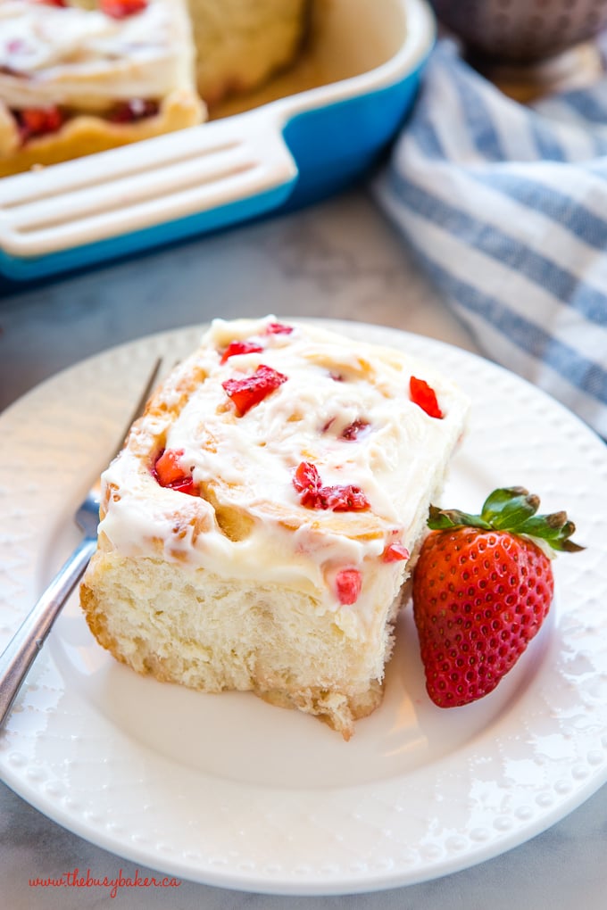 Strawberry Cheesecake Sweet Rolls on white plate with fork