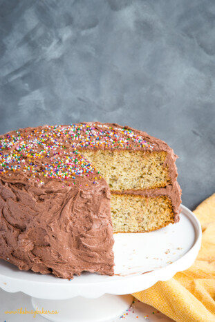 Banana Birthday Cake with Chocolate Frosting - The Busy Baker