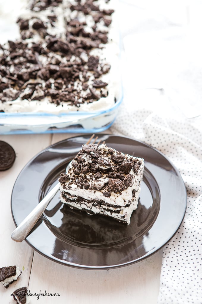 No Bake Cookies and Cream Oreo Icebox Cake on black plate with fork
