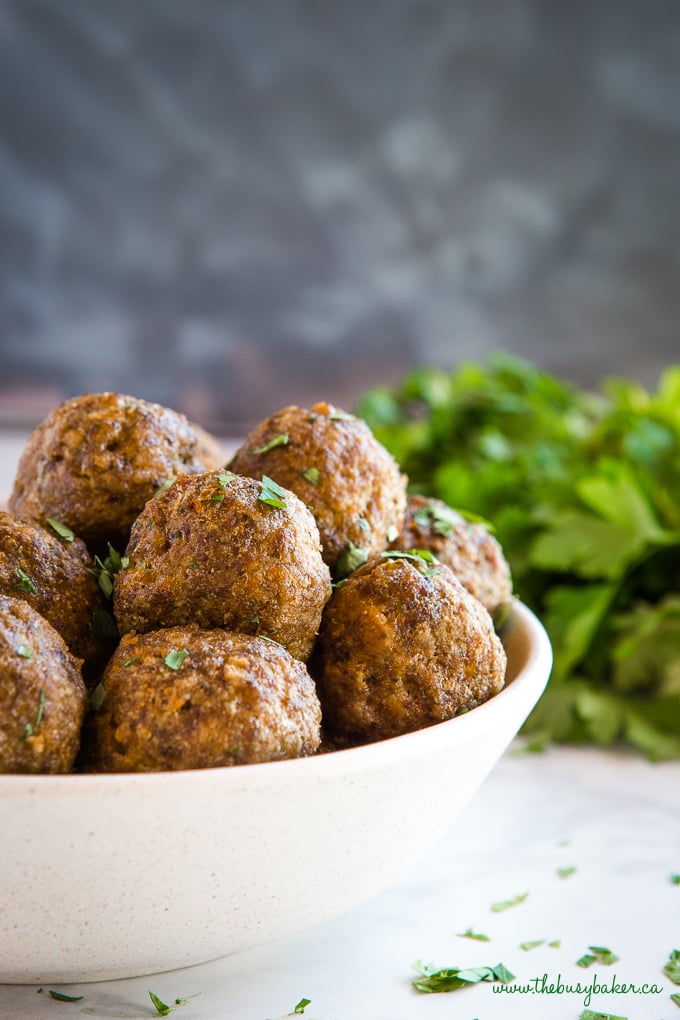 Meatballs in bowl with herbs