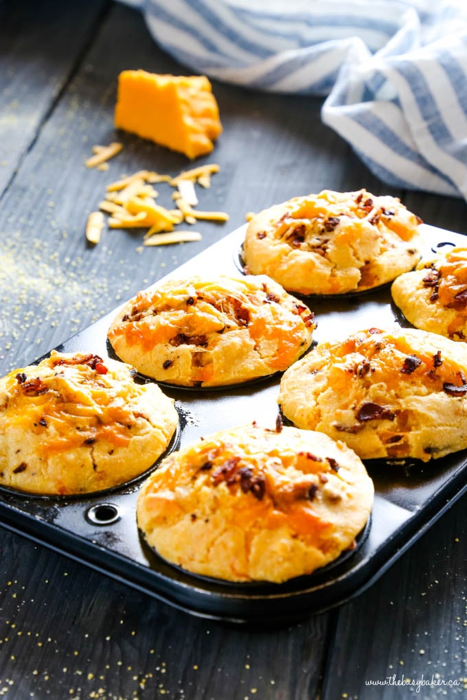 cornbread muffins in muffin tin with cheese