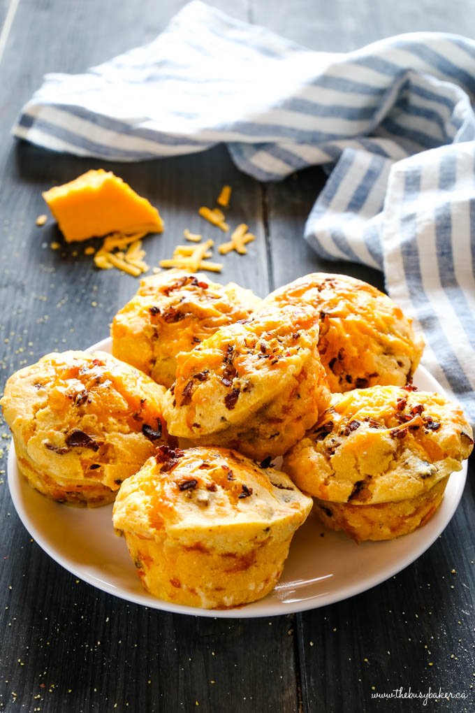 cornbread muffins on plate with cheese