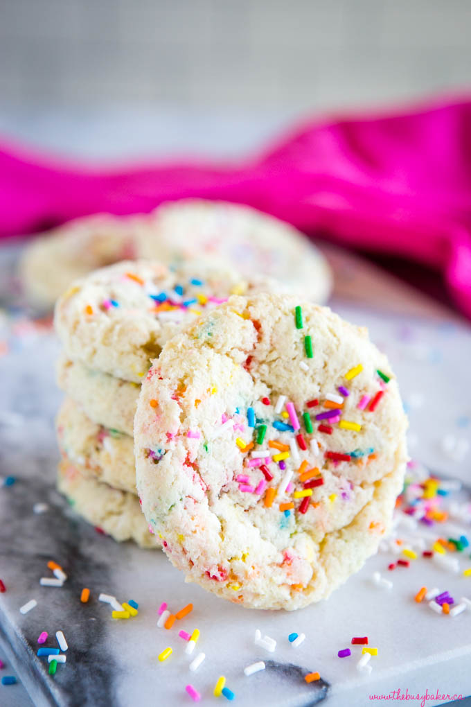 funfetti sugar cookies with pink background