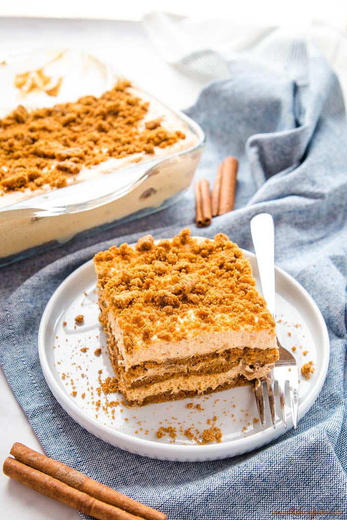 slice of gingerbread dessert on a plate with a fork