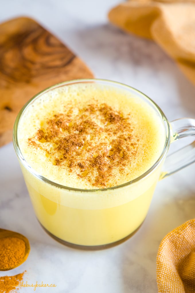 golden milk latte made with turmeric in glass mug