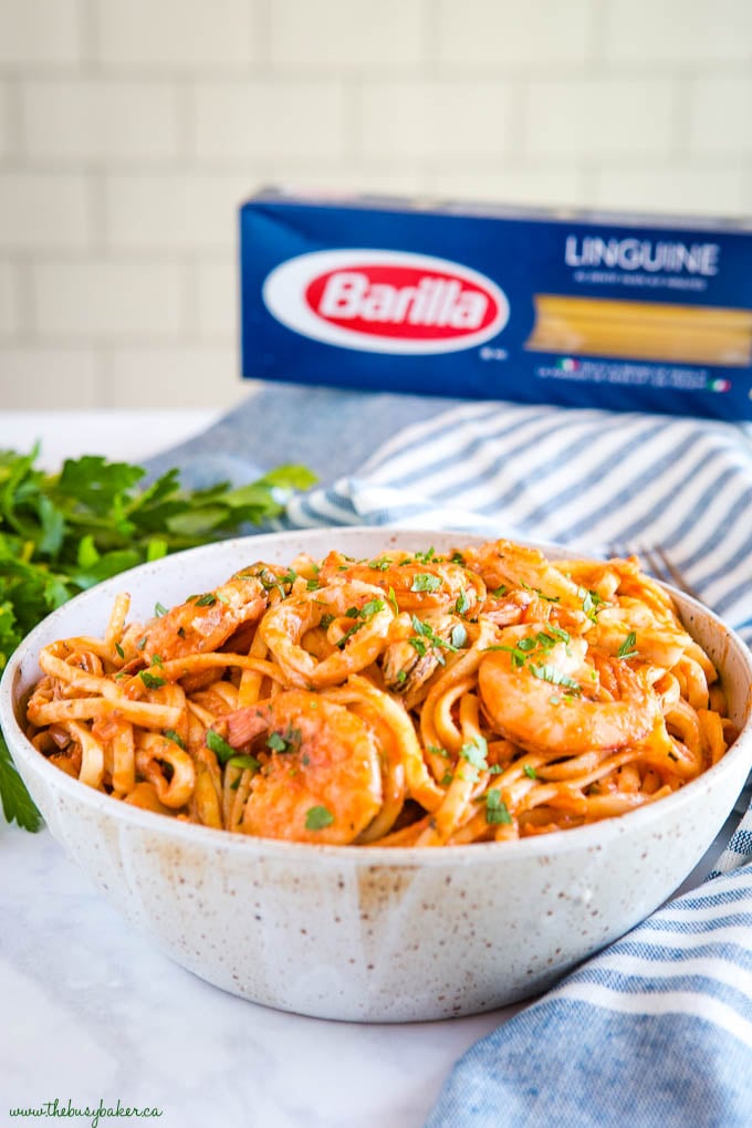 seafood marinara linguine in pottery bowl