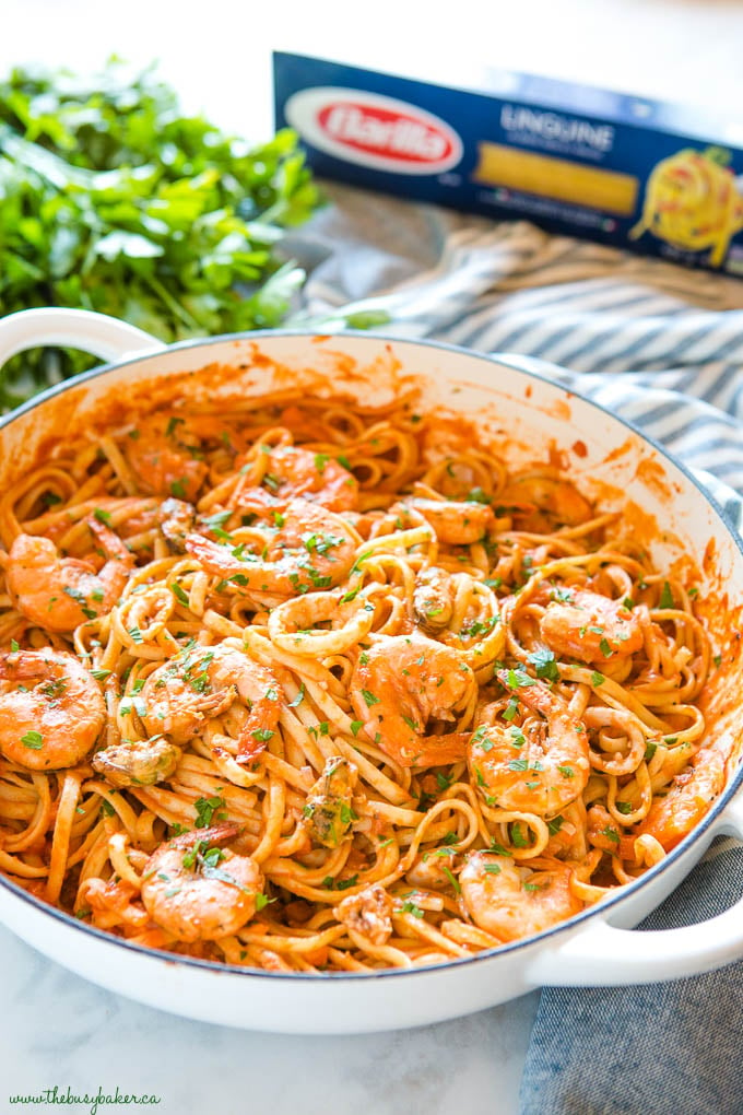 seafood marinara linguine in white cast iron skillet