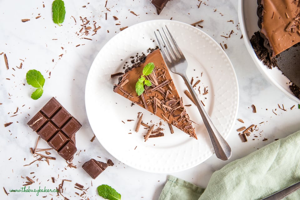 slice of peppermint chocolate tart with shaved chocolate