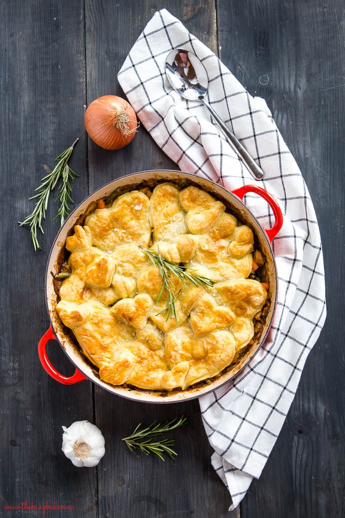 overhead photo of turkey pot pie in red cast iron pan