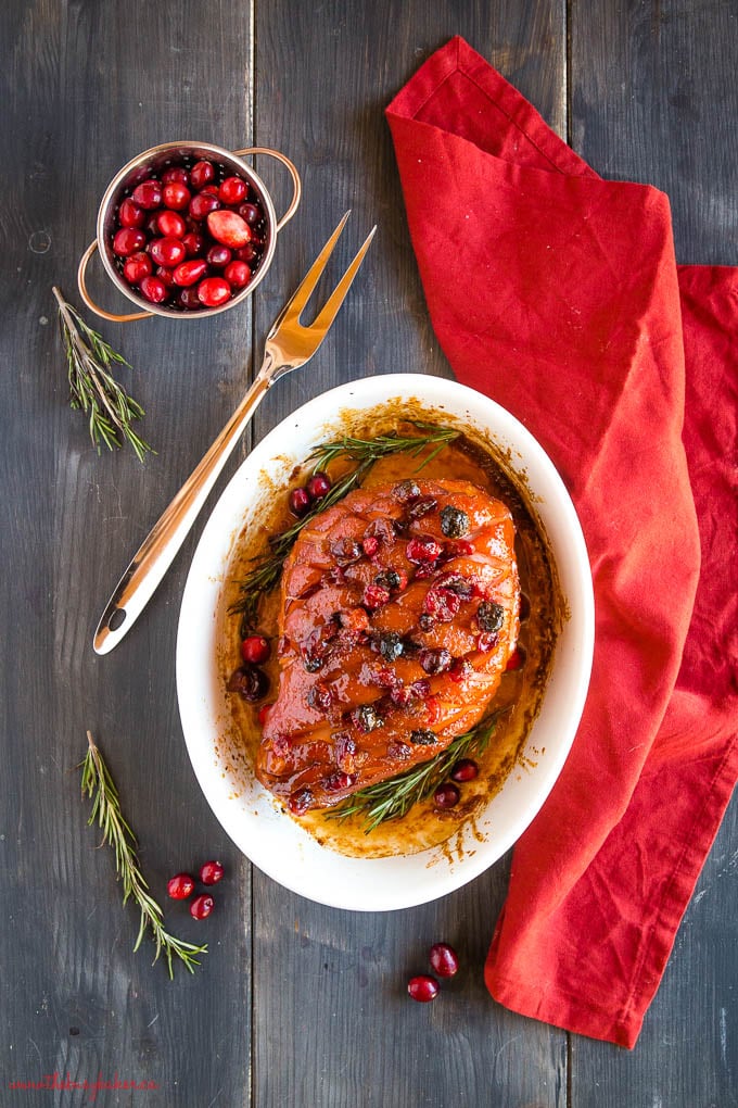 holiday christmas ham with cranberries and rosemary