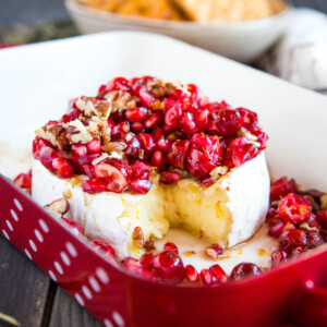 dish of pomegranate cranberry baked brie appetizer
