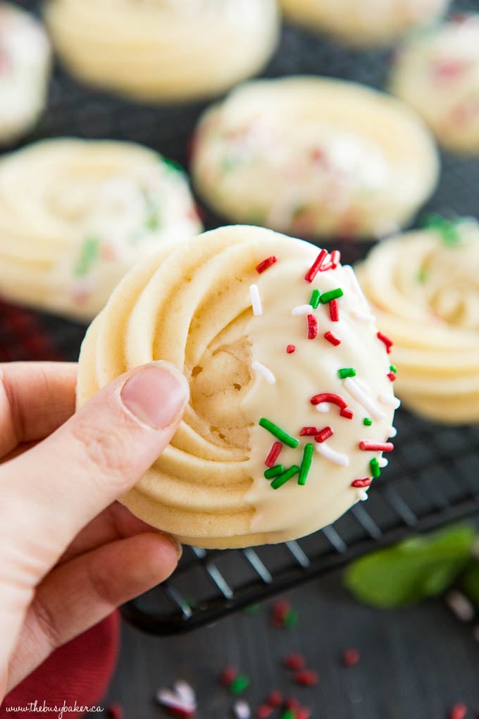 white chocolate shortbread cookie with peppermint and sprinkles