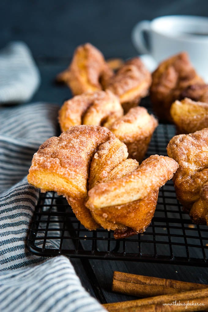 sugary cinnamon twists on a wire cooling rack