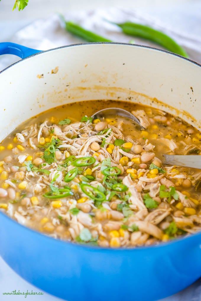 dairy-free white chicken chili in blue pot with jalapenos