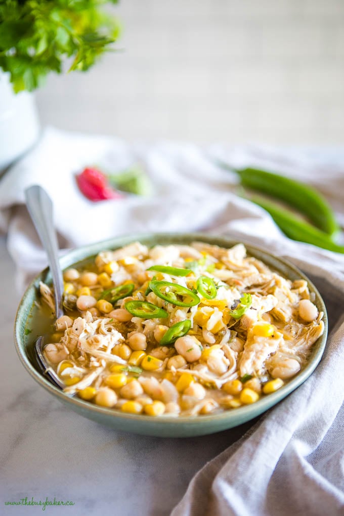 Dairy-Free White Chicken Chili in green bowl with spoon