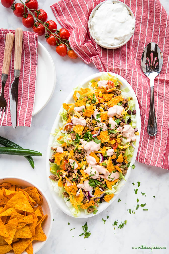 Mexican ground beef salad with chips and creamy dressing