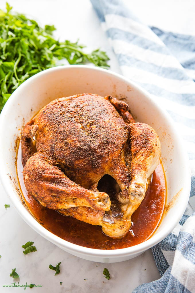 making rotisserie chicken in white baking dish