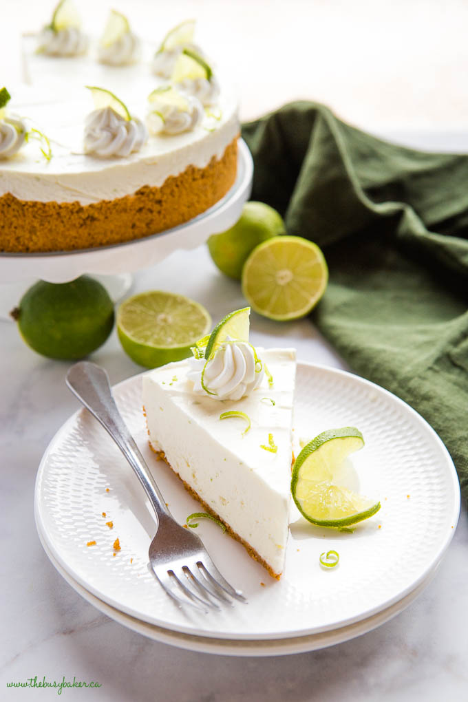 slice of easy no bake key lime cheesecake on white plate