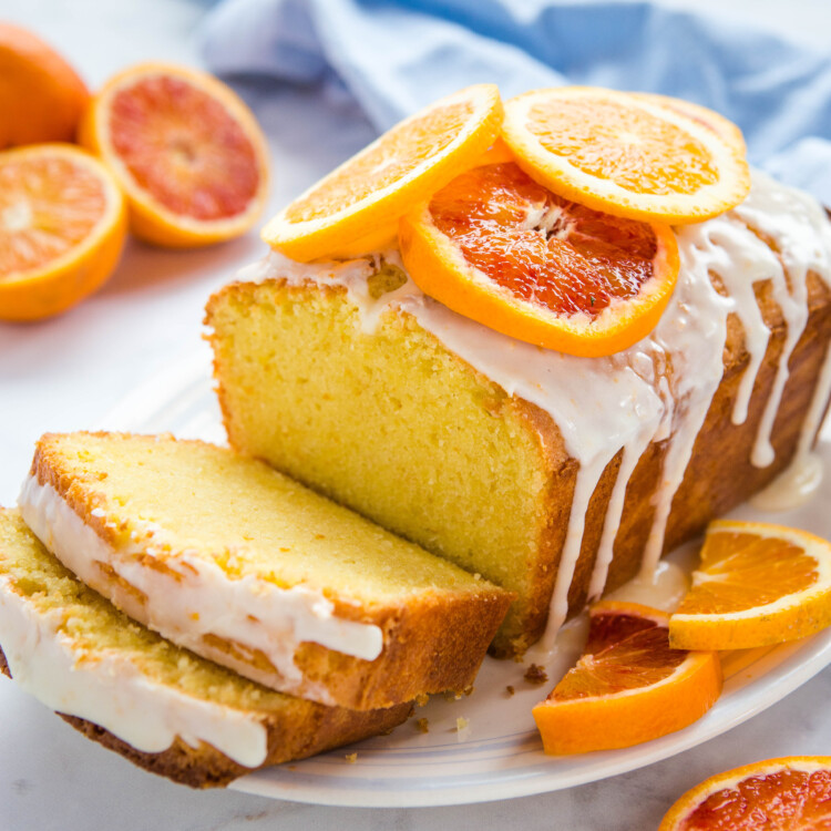 loaf of orange sour cream pound cake with citrus glaze