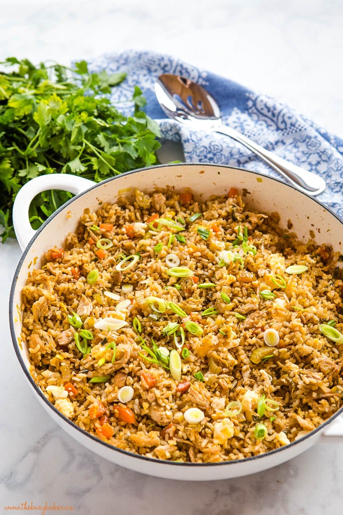 chicken fried rice in white cast iron pan