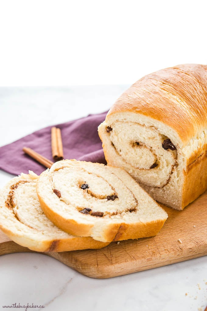 cinnamon raisin bread sliced on cutting board