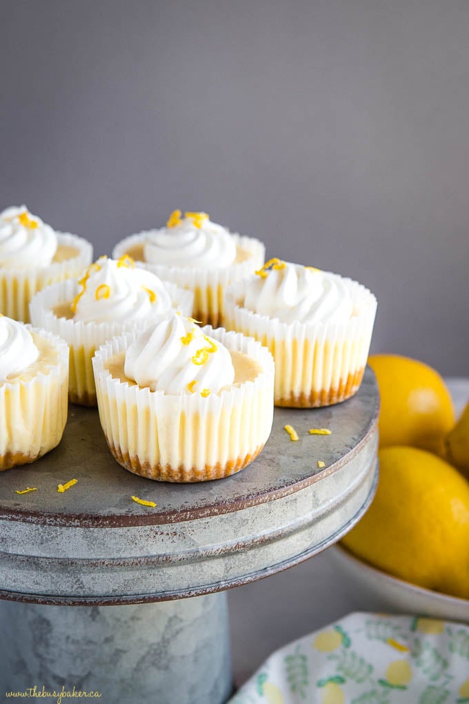 small lemon cheesecakes on cake stand