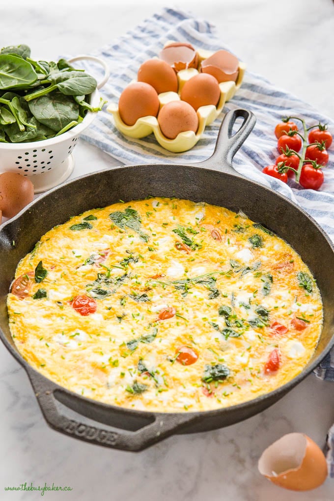 skillet frittata with eggs, tomatoes, spinach and goat cheese