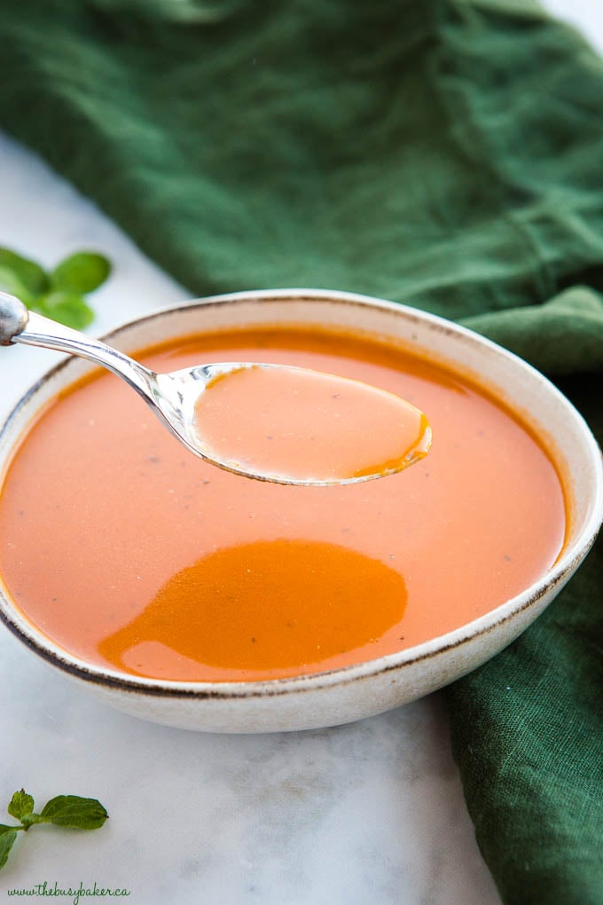 spoonful of creamy homemade tomato soup 