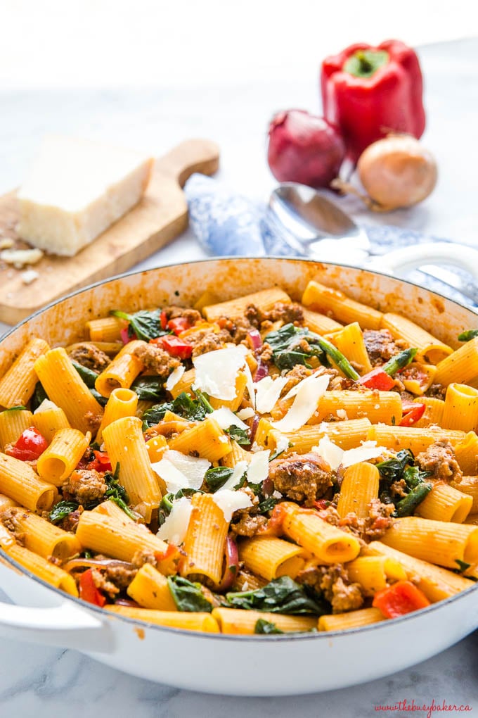 rigatoni pasta with pork, spinach, red onions, peppers and parmesan