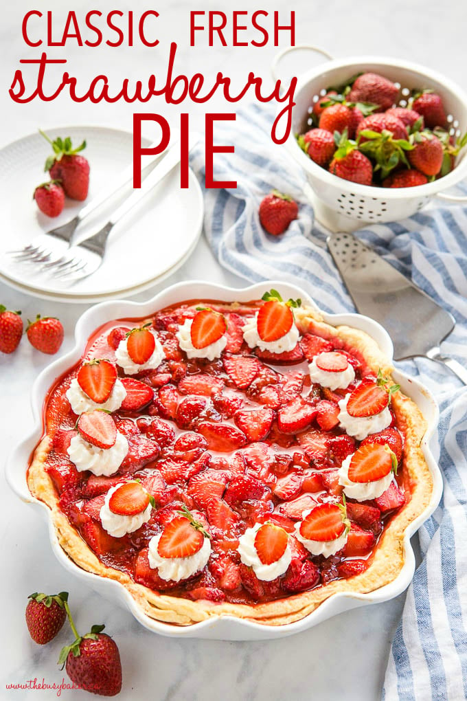 classic fresh strawberry pie with whipped cream and strawberries