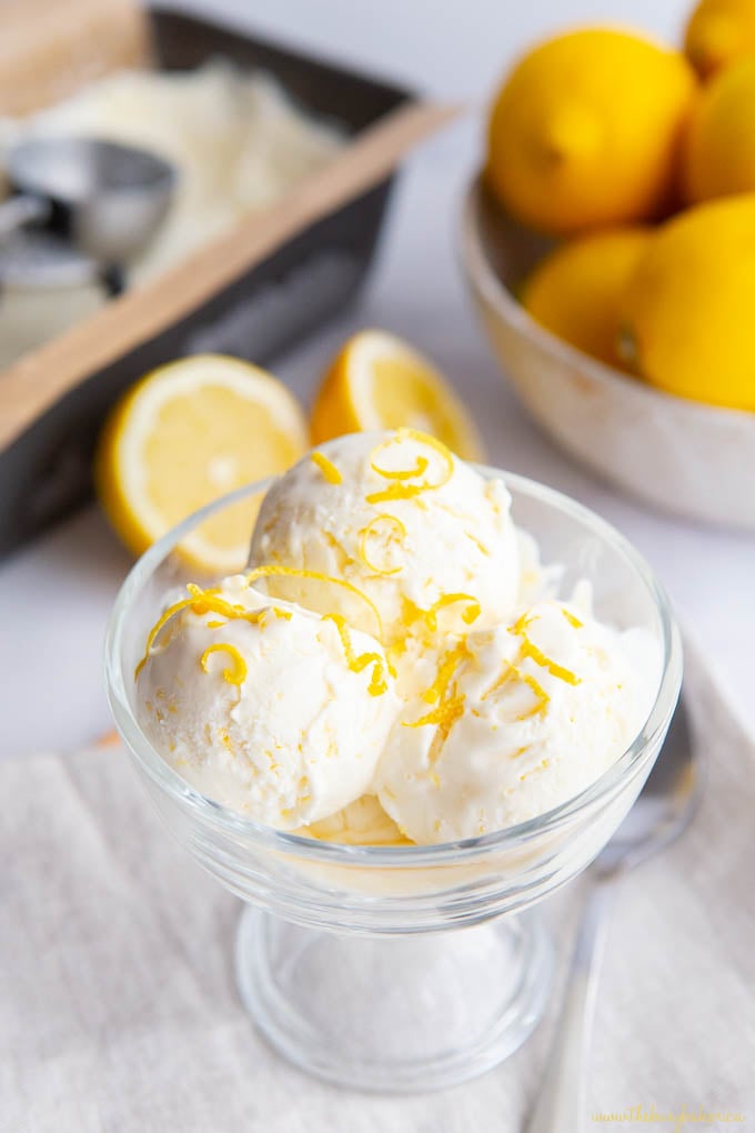 glass dish with lemon ice cream and lemon zest