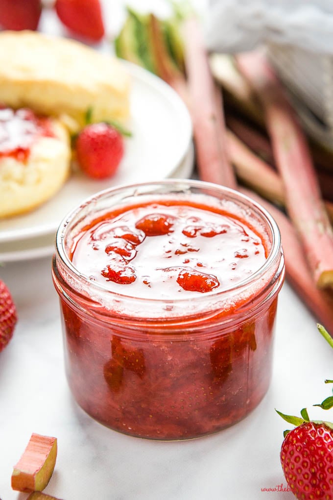 small jar of strawberry rhubarb jam closeup