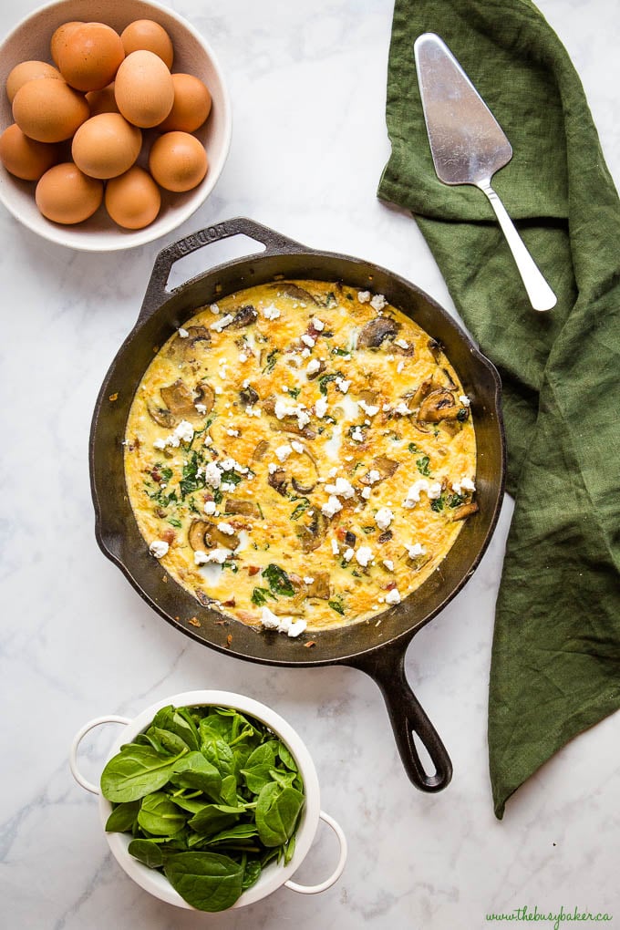 overhead image: cast iron skillet mushroom spinach frittata