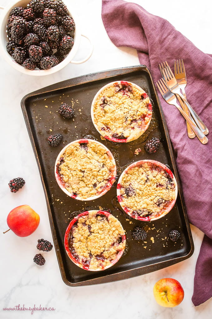 single serving apple blackberry crumble on baking tray