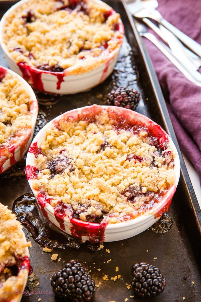 single serving apple blackberry crumble on baking sheet