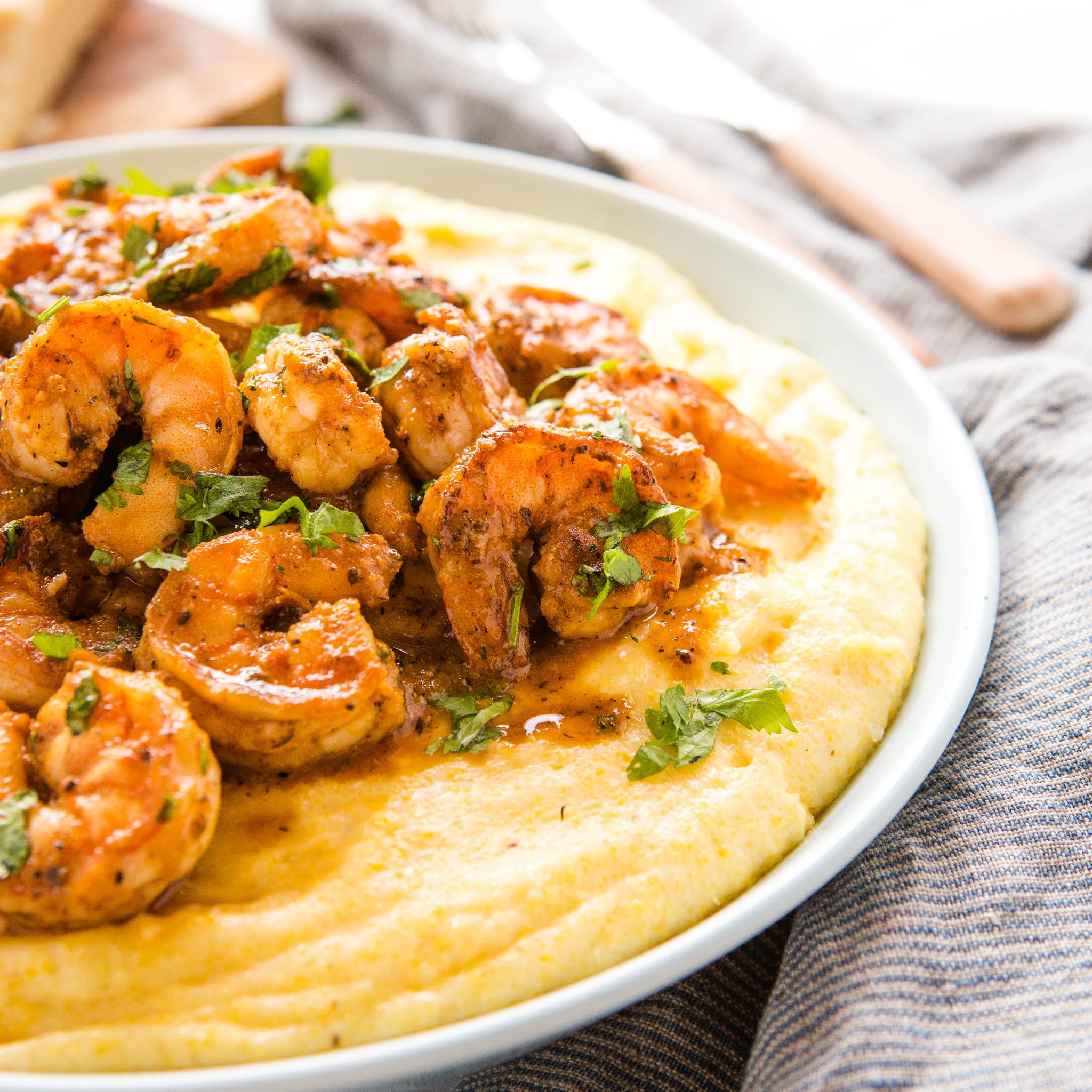 https://thebusybaker.ca/wp-content/uploads/2020/08/cajun-shrimp-with-cheesy-polenta-fb-ig-10-scaled.jpg