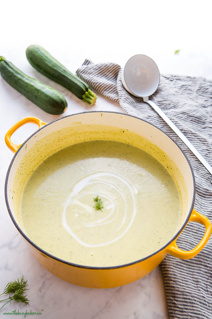 creamy zucchini soup in yellow pot