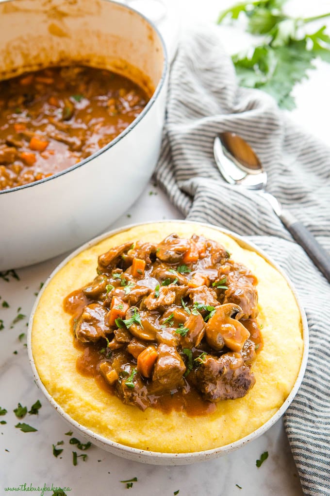 bowl of polenta with braised beef stew