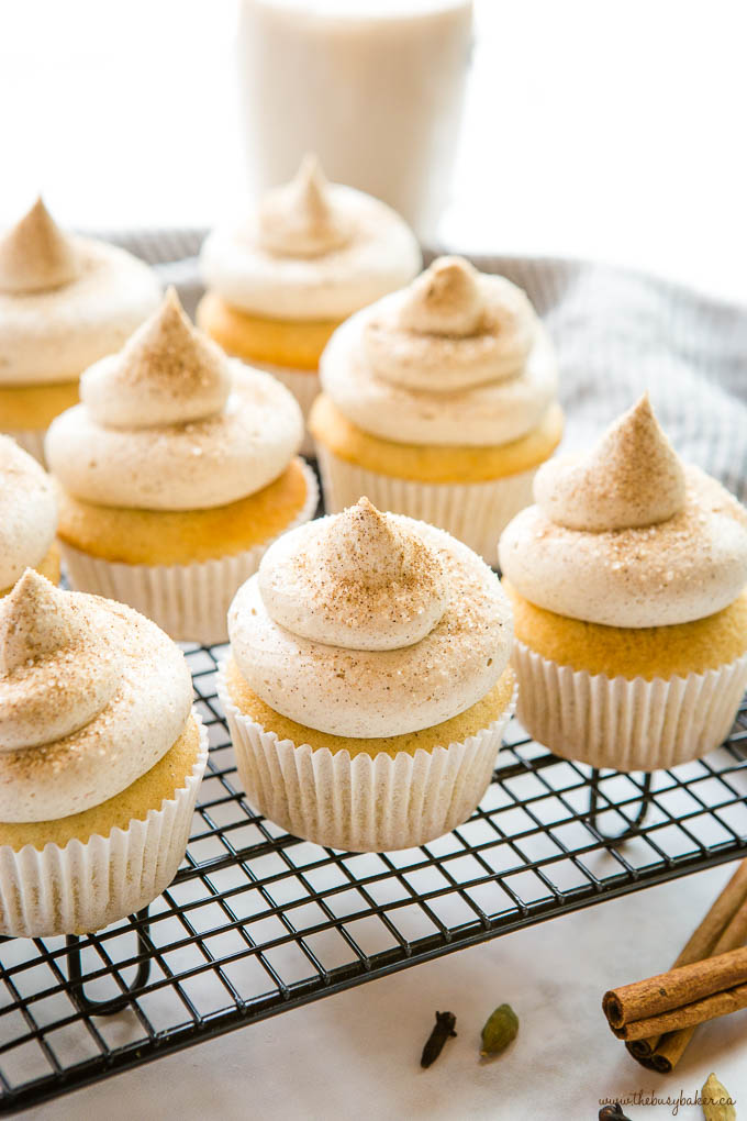 Chai Spice Cupcakes with Cinnamon Frosting on black wire rack