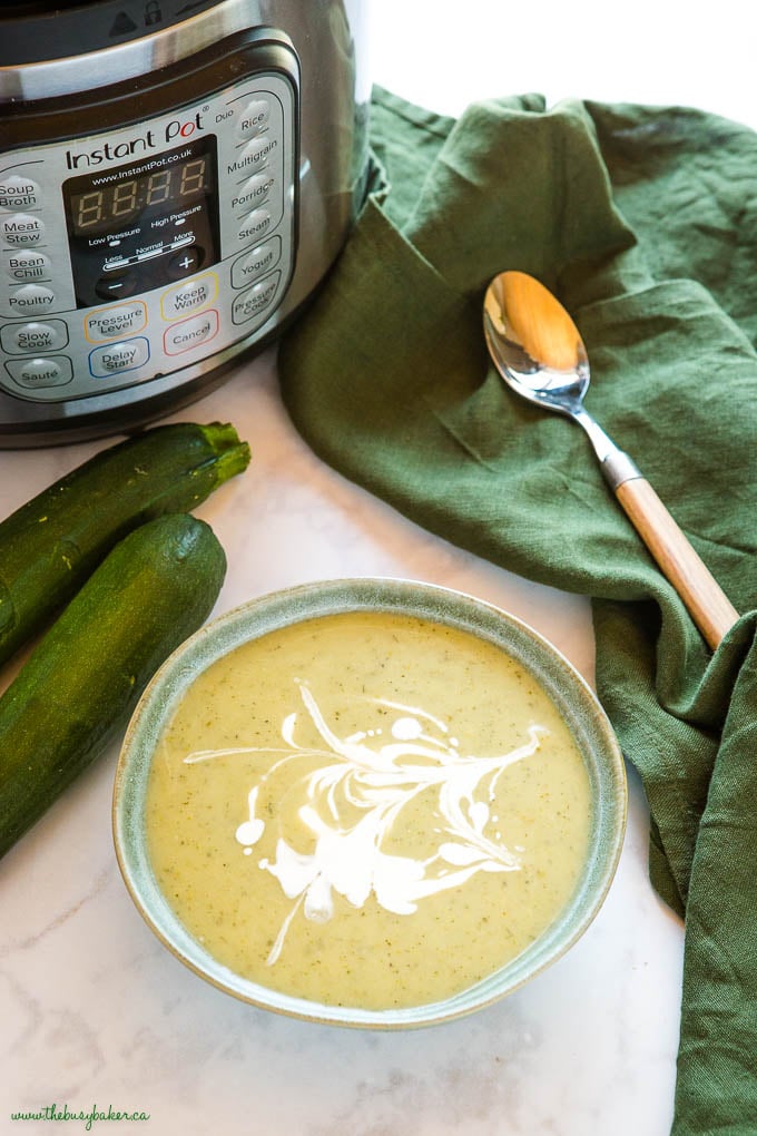 bowl of Instant Pot Zucchini Soup with cream