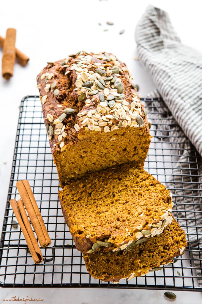 healthy pumpkin oat bread with oats, pumpkin seeds and cinnamon sticks