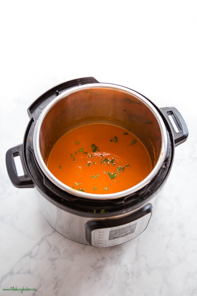 tomato soup in the Instant Pot with fresh basil