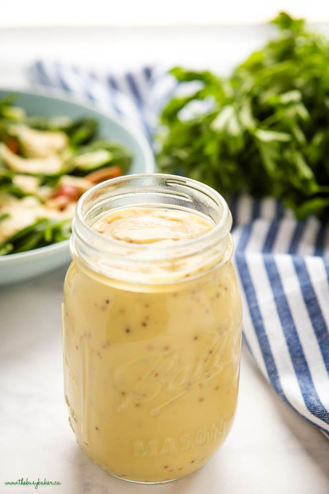 honey mustard salad dressing in a mason jar