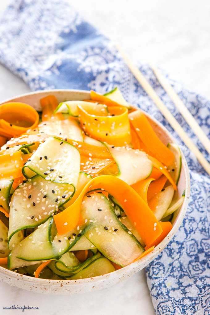closeup image: salad with cucumbers and carrots