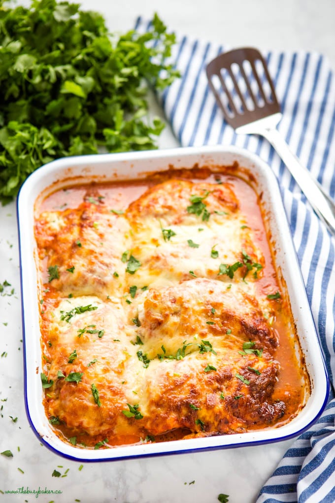 white pan with lasagna stuffed chicken