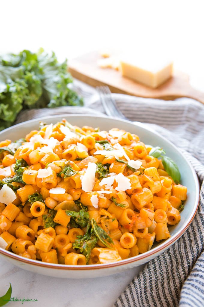 closeup image: ditalini pasta with beans in blue bowl