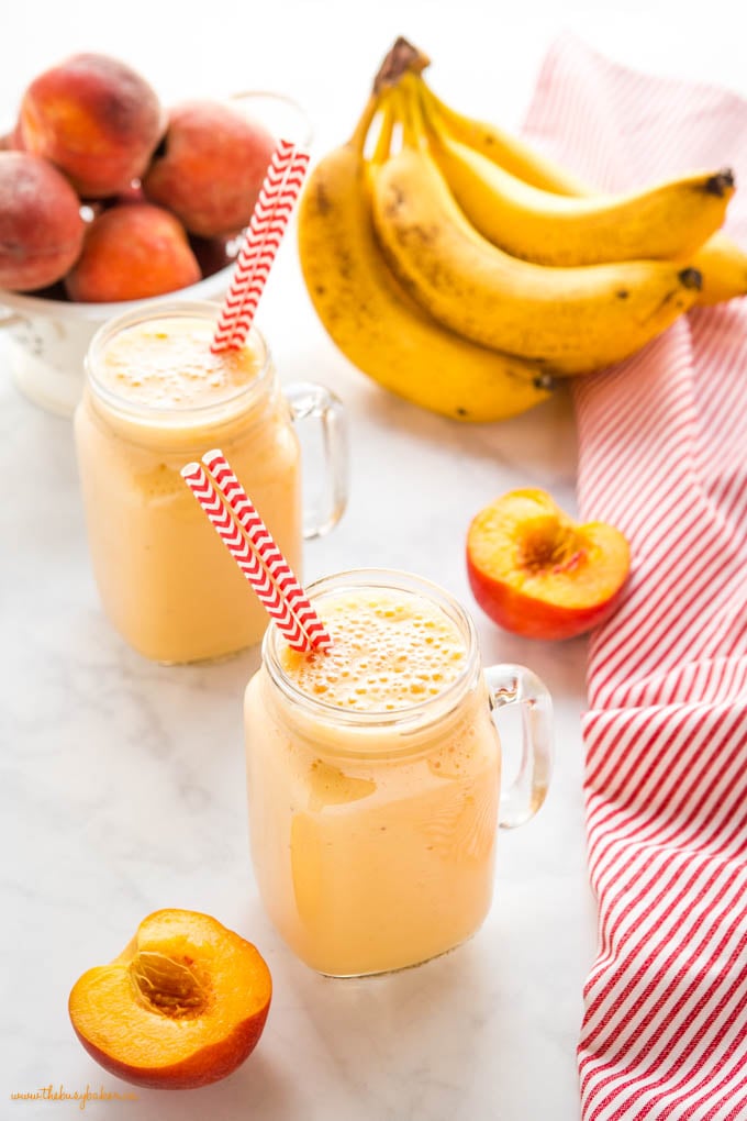 post workout banana peach smoothie in glass cup