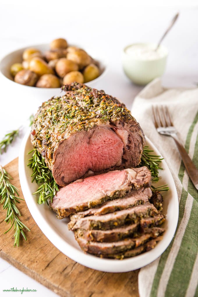 beef ribeye roast on white platter