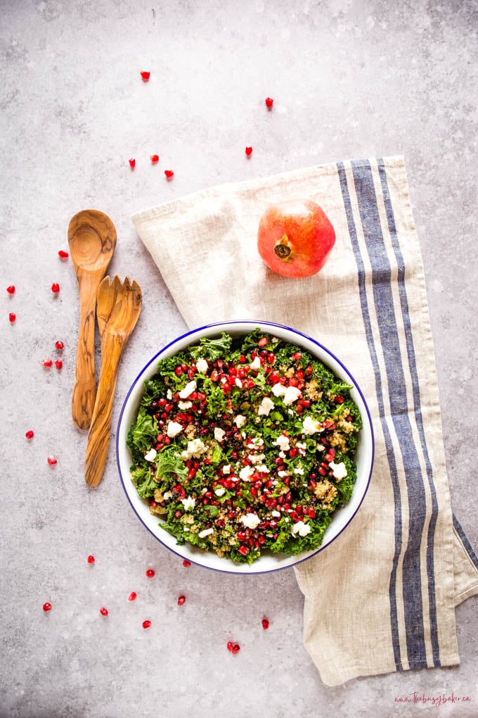 overhead image: salad with kale, pomegranate, goat cheese and quinoa